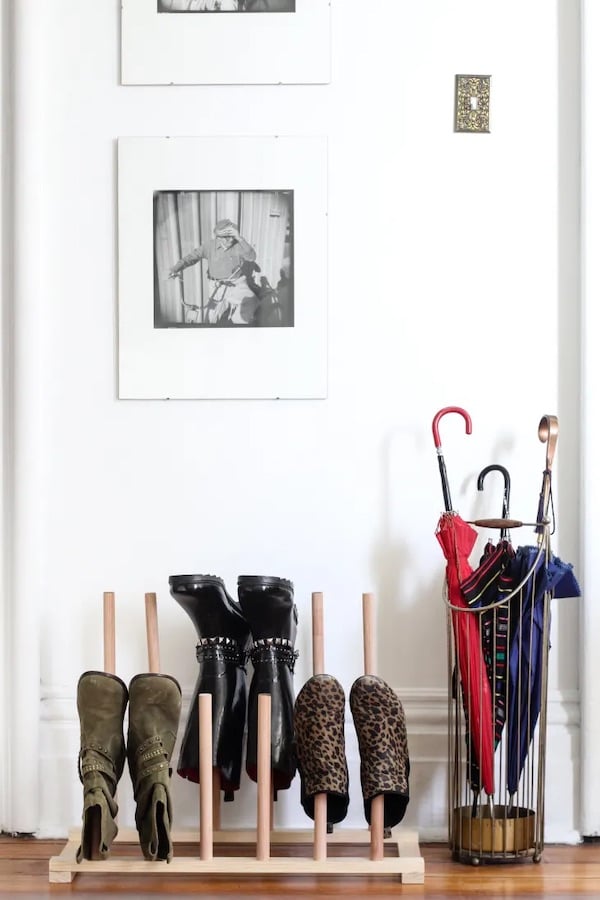 shoes on a diy shoe rack made from wooden dowels
