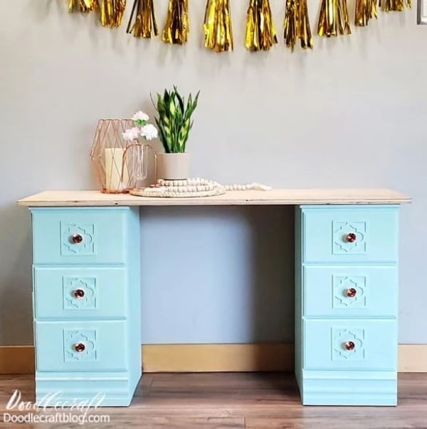 Two repurposed nightstands turned into a DIY desk with wood top for a small home office