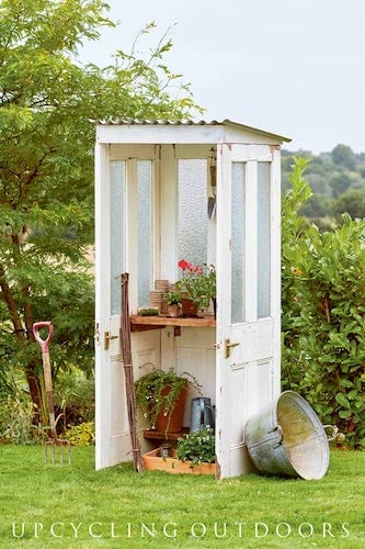 open front potting shed using old doors