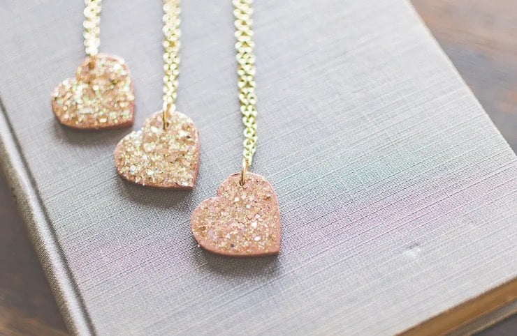 Shiny heart pendant on gold chain necklace