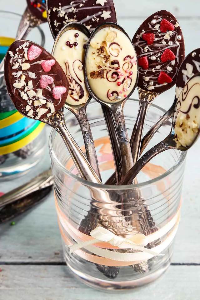 Chocolate spoons decorated with sprinkles and designs