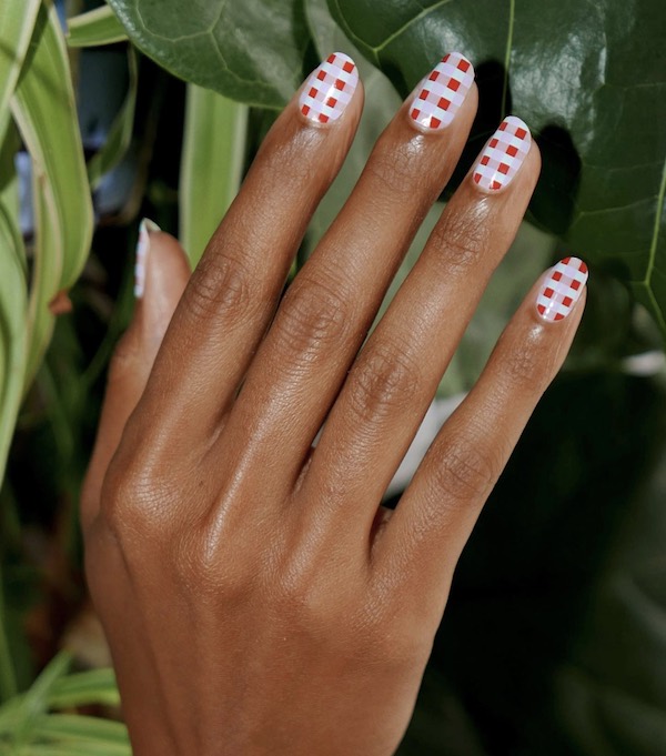 light pink, white, and red gingham checkered nail design