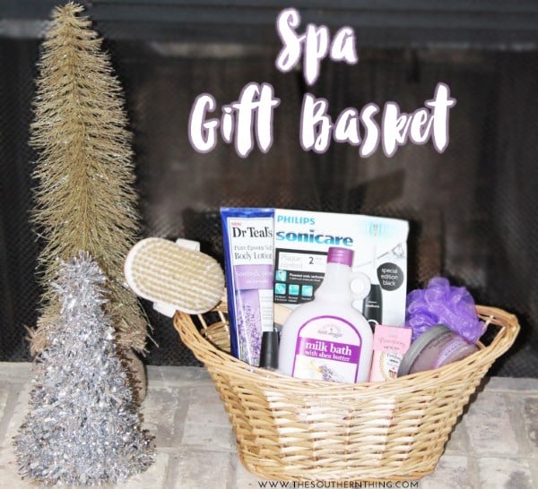 DIY spa gift basket with bath products, skincare, body brush, and self care items in a woven basket