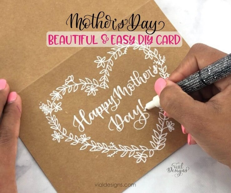 Hand drawn floral wreath Mother's Day card on kraft paper with white ink lettering