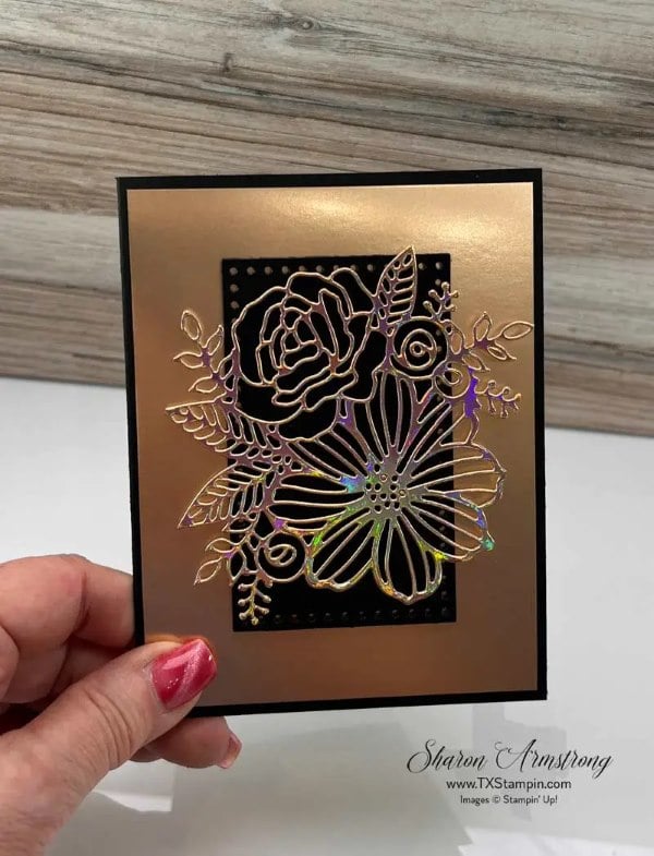 Elegant mother's day card with rose gold foil floral design on dark background