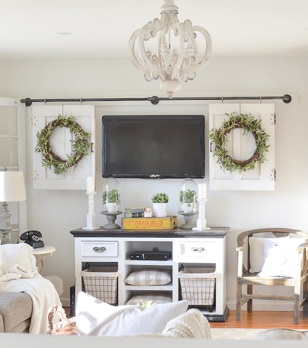 curtain rod with sliding panels to hide a tv